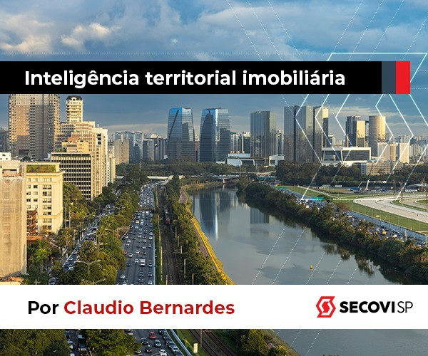 gestão condominial - vista aérea urbana com rio, avenidas e prédios representando inteligência territorial imobiliária
